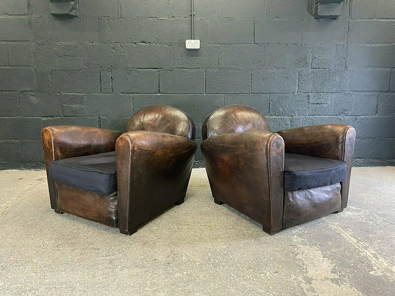Pair of french leather club chairs – A rare vintage treasure