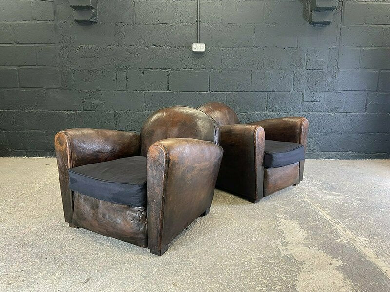 Pair of french leather club chairs – A rare vintage treasure