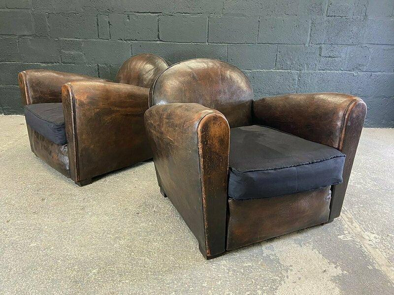Pair of french leather club chairs – A rare vintage treasure