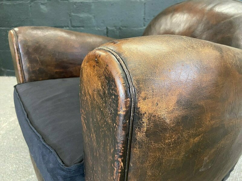 Pair of french leather club chairs – A rare vintage treasure