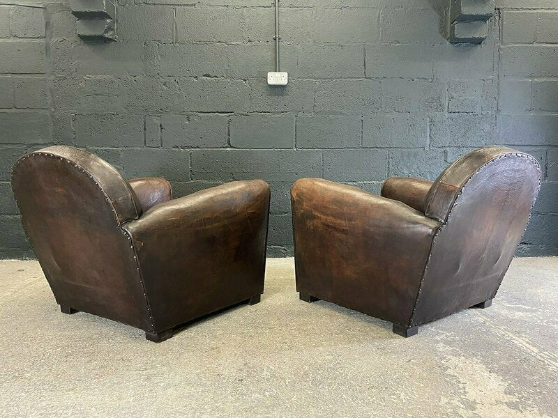 Pair of french leather club chairs – A rare vintage treasure